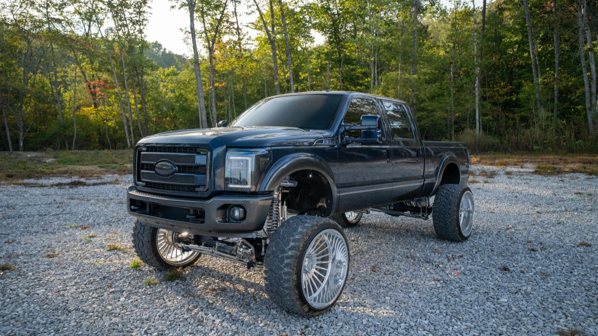 Front three-quarter close-up of Blue Collar on gravel